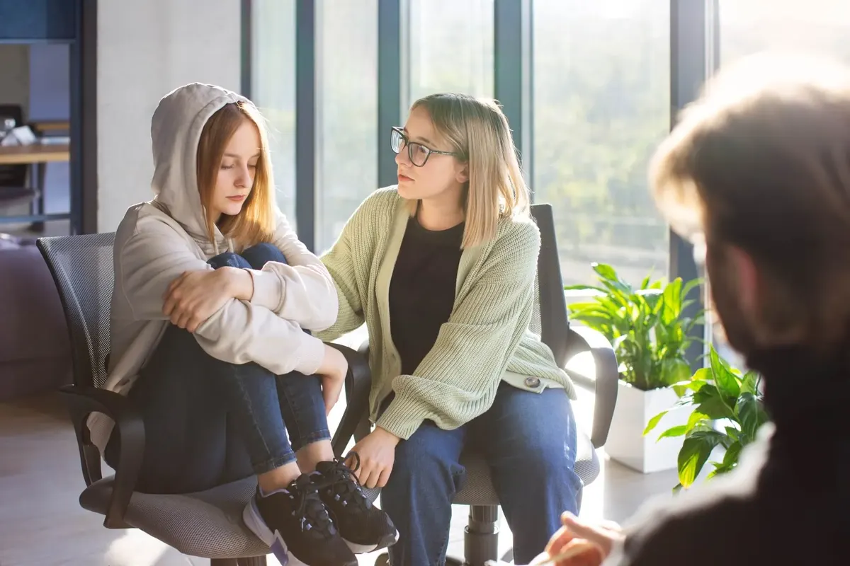 Supportive conversation with a young person during a mental health consultation