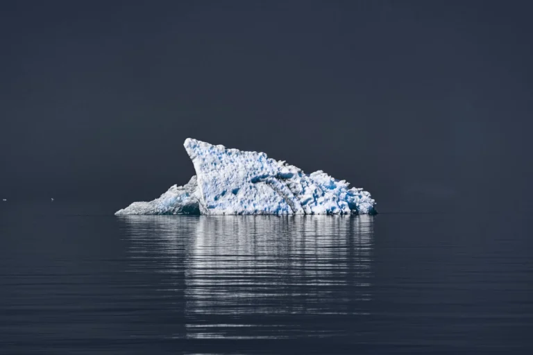 Iceberg floating in dark water representing personality disorders